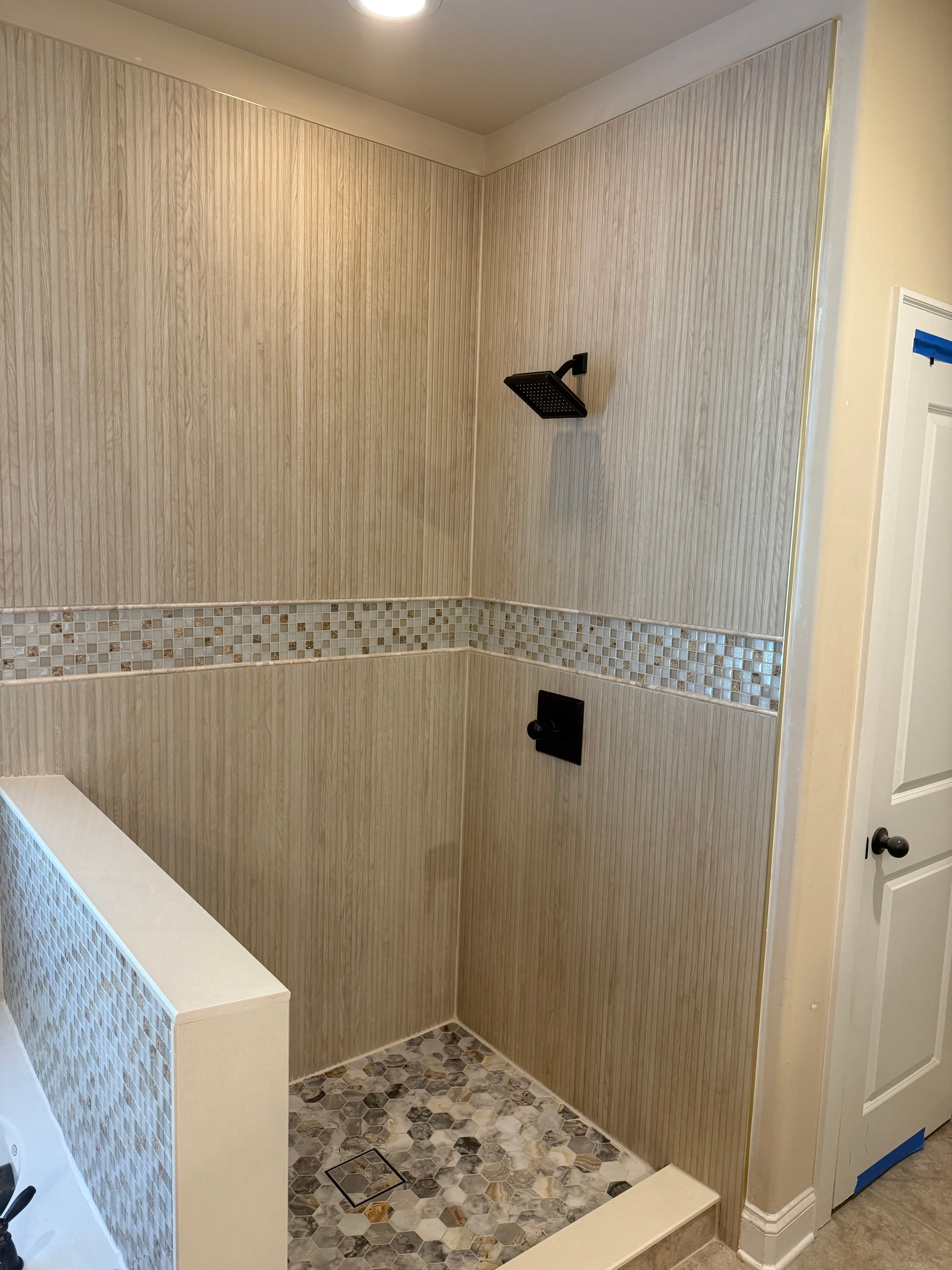 Modern Industrial Shower Finish by Alliance Construction